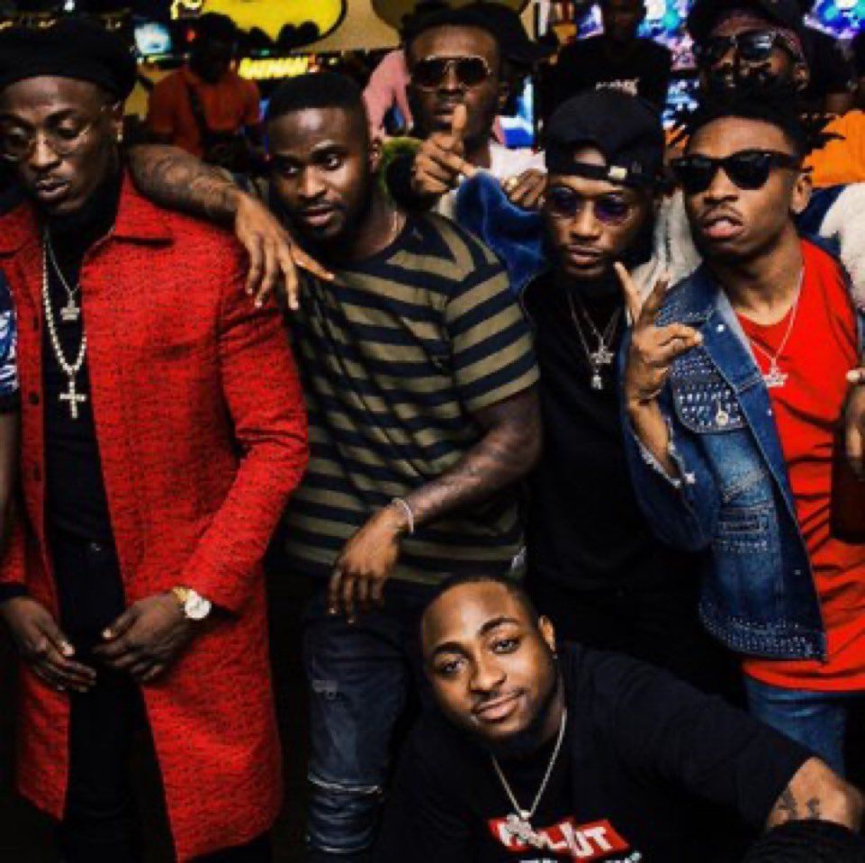 Peruzzi (far left) and Mayorkun (far right) both used to be label mates at Davido's DMW.
